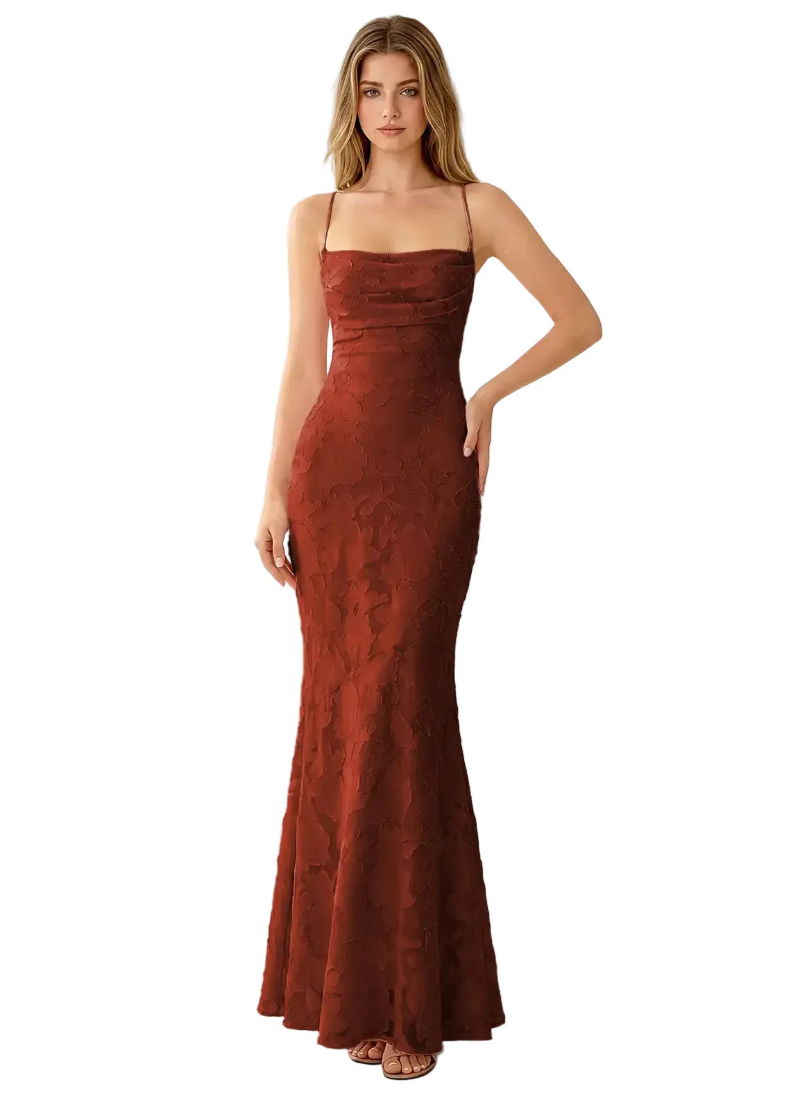 Woman wearing a rust-colored evening gown on a white background